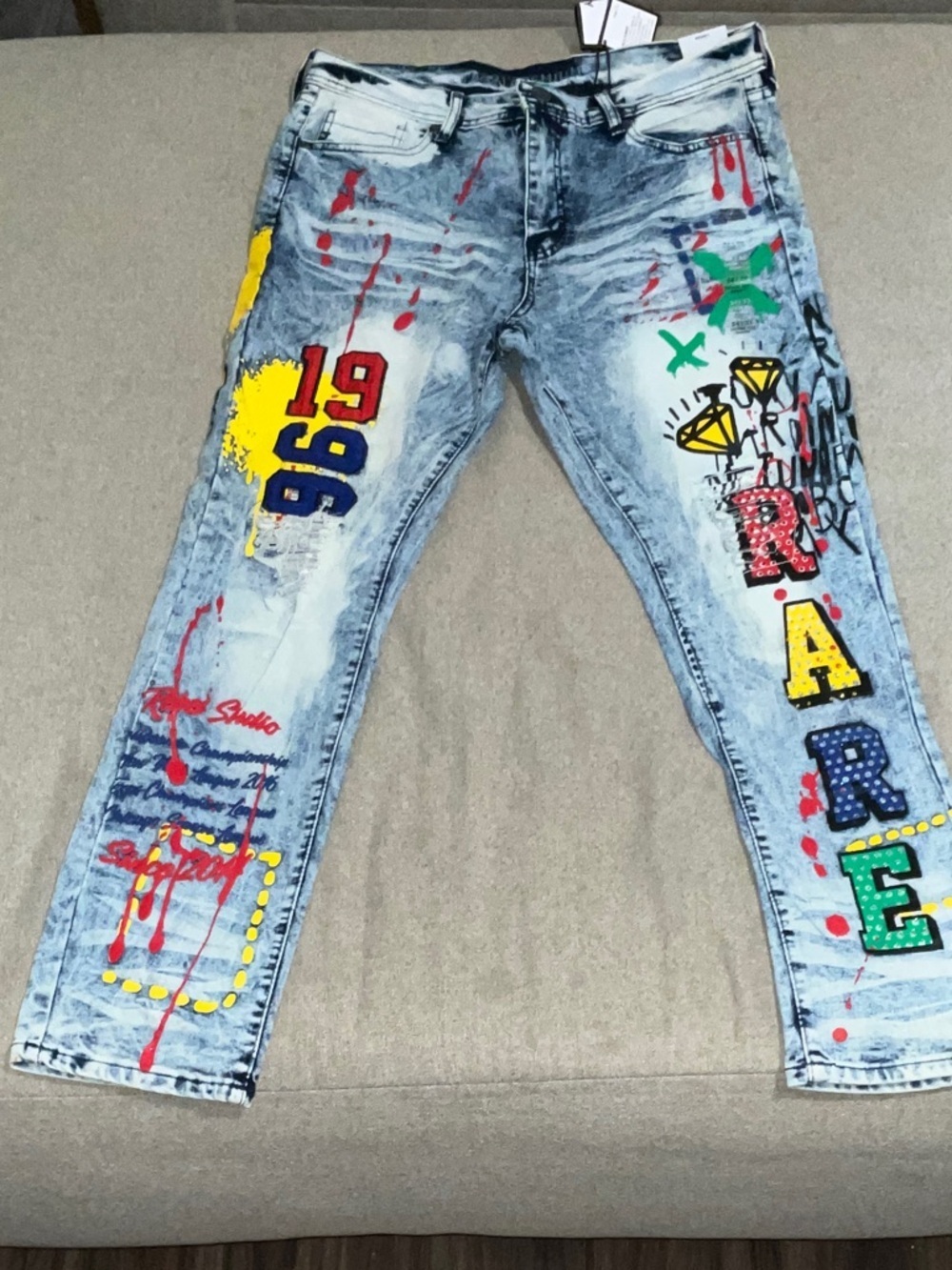 Rue21 Light Wash Slim Jeans with Multicolor Graffiti Accents